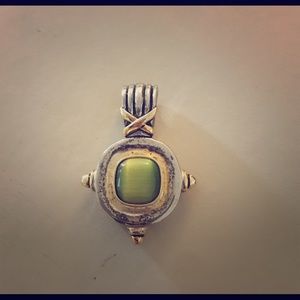 Green stone pendant with antique silver and gold